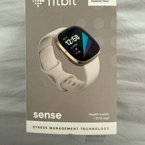 Fitbit Gold and White Smartwatch with Stress Management
